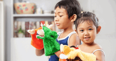 Children playing with puppets