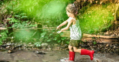 A child jumping in the mud