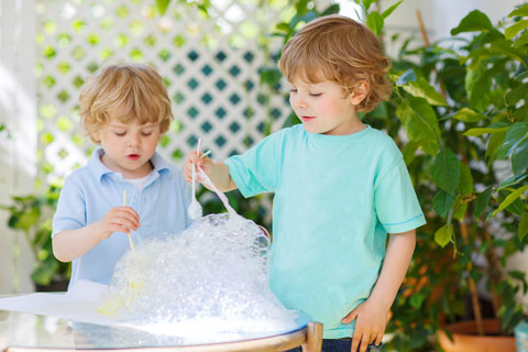 two boys with bubbles