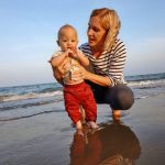 mom and toddler at the beach