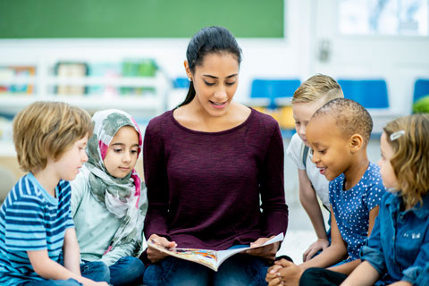 woman reading to children