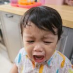 Toddler crying to the camera