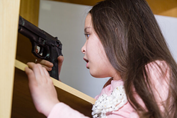 girl finds gun in closet