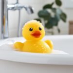 Yellow rubber duck in bathtub