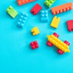 multi color legos on blue background